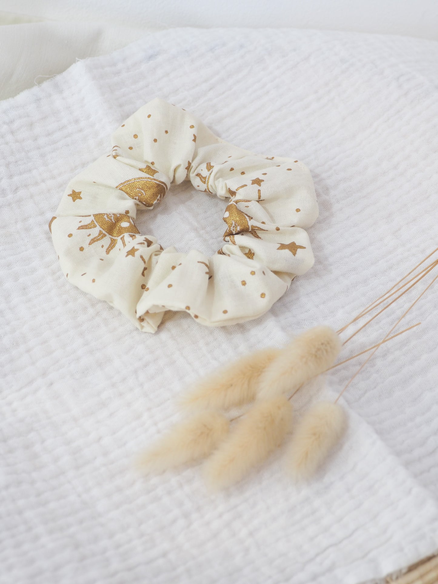 Chouchou astres dorés