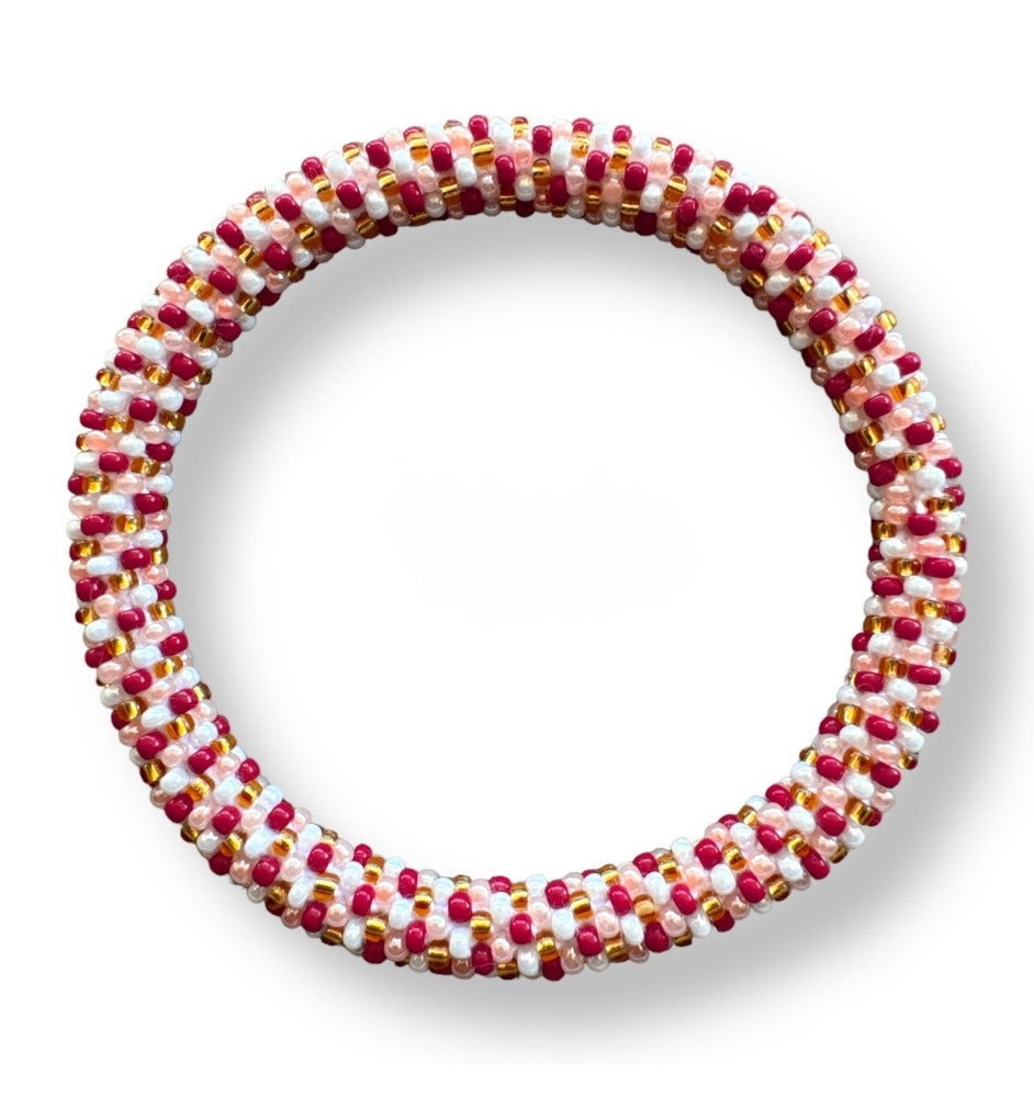 Bracelet népalais rouge/doré/rose