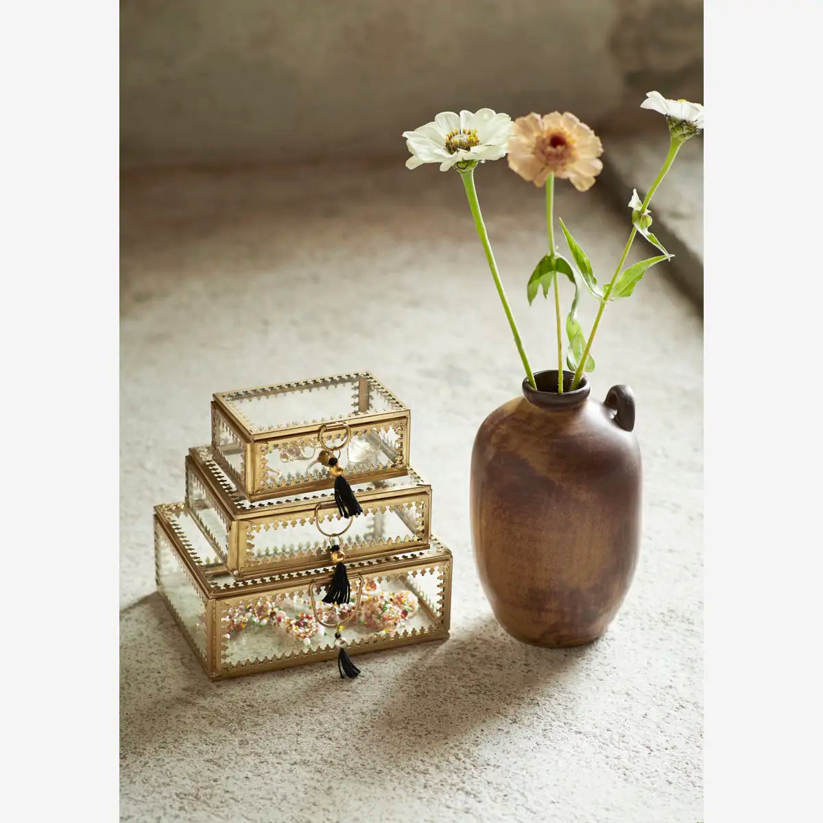 Boite en verre et laiton pompon